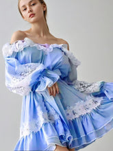 Mini-robe asymétrique à volants brodés